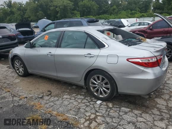 2016 Toyota Camry XLE with VIN 4T1BK1FK0GU030129, listed as a Copart auction lot 83759015 with 134,158 mi miles and Salvage title. Bid and sale history available at DreamBid. Image 2.