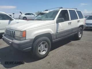 1998 Jeep Grand Cherokee Laredo z VIN 1J4FX58SXWC358135, wystawiony jako Copart lot #70931825 z przebiegiem 149 638 mil mil oraz Szkoda całkowita • Salvage title. Historia ofert i sprzedaży dostępna na DreamBid. Obrazek 1.