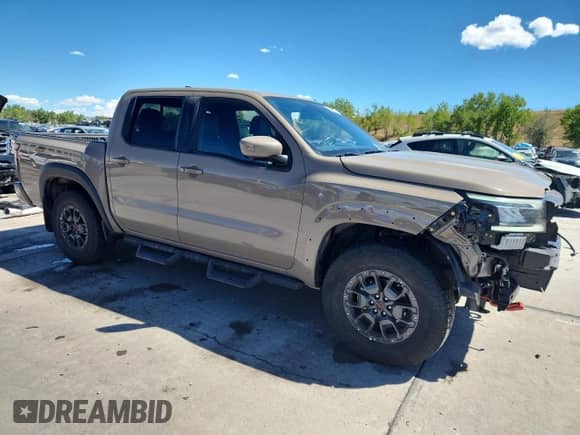 2024 Nissan Frontier Pro-4X with VIN 1N6ED1EK5RN613089, listed as a Copart auction lot 71288745 with 6,282 mi miles and Salvage title. Bid and sale history available at DreamBid. Image 4.