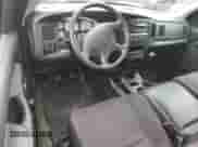 2003 Dodge 1500 ST with VIN 1D7HA16N73J624035, listed as a Copart auction lot 64455925 with 211,168 mi miles and Salvage title. Bid and sale history available at DreamBid. Image 8.