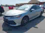 2021 Toyota Camry Hybrid XLE with VIN 4T1F31AK5MU565376, listed as a IAAI auction lot 42687616 with 57,880 mi miles and . Bid and sale history available at DreamBid. Image 2.