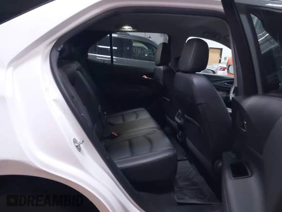 2021 Chevrolet Equinox Premier with VIN 2GNAXXEV4M6128145, listed as a IAAI auction lot 41893046 with 39,492 mi miles and . Bid and sale history available at DreamBid. Image 8.