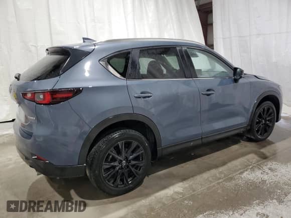 2023 Mazda CX-5 S Carbon Edition z VIN JM3KFBCM0P0292011, wystawiony jako Copart lot #71715585 z przebiegiem 30 893 mil mil oraz Szkoda całkowita • Salvage title. Historia ofert i sprzedaży dostępna na DreamBid. Obrazek 3.