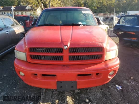 2000 Dodge 1500 with VIN 1B7HF13Z5YJ190790, listed as a Copart auction lot 87027165 with 128,358 mi miles and Salvage title. Bid and sale history available at DreamBid. Image 5.
