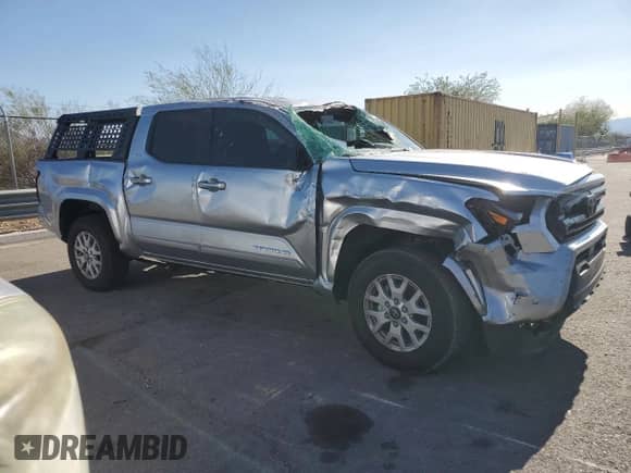 2025 Toyota Tacoma SR z VIN 3TYLB5JNXST071855, wystawiony jako Copart lot #80313875 z przebiegiem 8 960 mil mil oraz Szkoda całkowita • Salvage title. Historia ofert i sprzedaży dostępna na DreamBid. Obrazek 4.