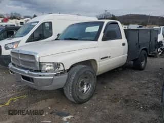 2001 Dodge RAM with VIN 3B6KC26Z31M511545, listed as a Copart auction lot 82887004 with 194,049 mi miles and Salvage title. Bid and sale history available at DreamBid. Image 1.