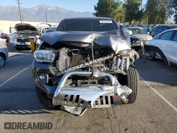 2017 Toyota Tacoma SR5 with VIN 3TMAZ5CN9HM035496, listed as a Copart auction lot 82316145 with 110,087 mi miles and Salvage title. Bid and sale history available at DreamBid. Image 5.