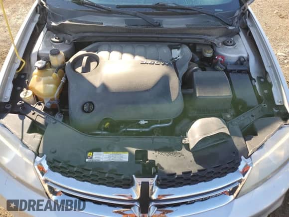 2012 Dodge Avenger SXT Plus with VIN 1C3CDZEG9CN222298, listed as a Copart auction lot 71292635 with 146,601 mi miles and Salvage title. Bid and sale history available at DreamBid. Image 11.