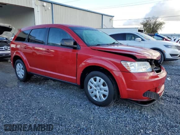 2015 Dodge Journey SE with VIN 3C4PDCAB1FT688624, listed as a Copart auction lot 85358454 with 140,280 mi miles and Salvage title. Bid and sale history available at DreamBid. Image 4.