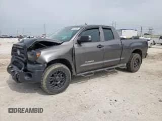 2013 Toyota Tundra with VIN 5TFRM5F14DX062376, listed as a Copart auction lot 63254985 with 212,127 mi miles and Salvage title. Bid and sale history available at DreamBid. Image 1.
