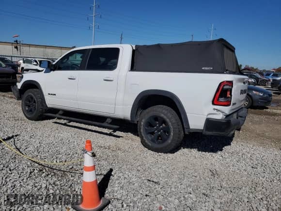 2022 Ram 1500 Rebel z VIN 1C6SRFLM5NN386108, wystawiony jako Copart lot #73565094 z przebiegiem 50 778 mil mil oraz Szkoda całkowita • Salvage title. Historia ofert i sprzedaży dostępna na DreamBid. Obrazek 2.