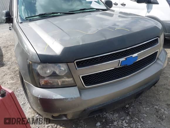 2007 Chevrolet Tahoe LS with VIN 1GNFC13C07R272851, listed as a IAAI auction lot 43310420 with 308,519 mi miles and . Bid and sale history available at DreamBid. Image 6.