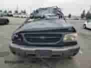 1999 Ford Explorer XLT z VIN 1FMZU34E6XZC14009, wystawiony jako Copart lot #55251525 z przebiegiem 253 681 mil mil oraz Szkoda całkowita • Salvage title. Historia ofert i sprzedaży dostępna na DreamBid. Obrazek 5.