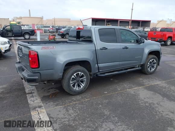 2022 Chevrolet Colorado 2WD Z71 z VIN 1GCGSDENXN1173627, wystawiony jako IAAI lot #42406970 z przebiegiem 21 937 mil mil oraz . Historia ofert i sprzedaży dostępna na DreamBid. Obrazek 4.