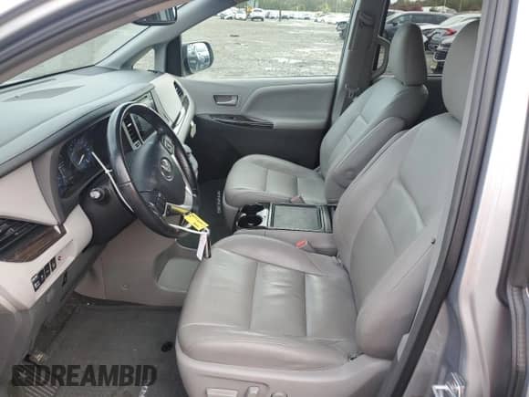 2015 Toyota Sienna XLE with VIN 5TDYK3DC1FS687918, listed as a Copart auction lot 86643375 with 121,810 mi miles and Salvage title. Bid and sale history available at DreamBid. Image 7.