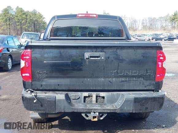 2021 Toyota Tundra SR5 with VIN 5TFDY5F10MX964425, listed as a IAAI auction lot 41843735 with 108,005 mi miles and . Bid and sale history available at DreamBid. Image 16.