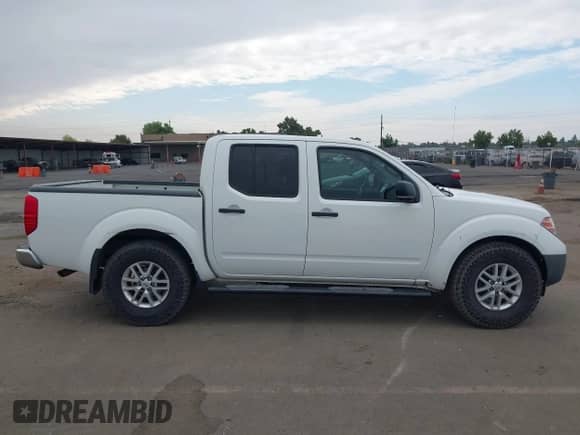 2015 Nissan Frontier SV with VIN 1N6AD0ER4FN751322, listed as a IAAI auction lot 43276518 with 124,404 mi miles and . Bid and sale history available at DreamBid. Image 13.