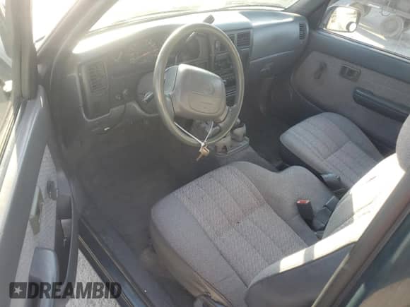1997 Toyota Tacoma with VIN 4TAVL52N7VZ330736, listed as a Copart auction lot 82432415 with 376,229 mi miles and Salvage title. Bid and sale history available at DreamBid. Image 8.