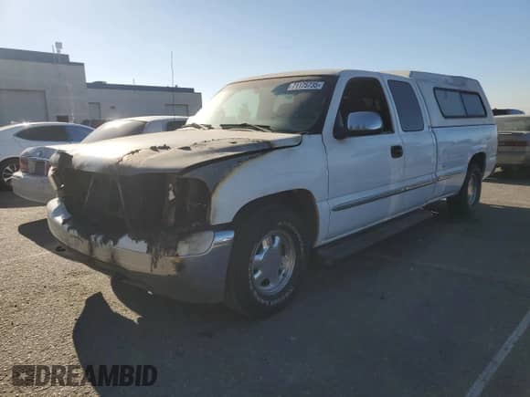 2002 GMC Sierra 1500 SLE1 z VIN 1GTEC19TX2E216332, wystawiony jako Copart lot #71175735 z przebiegiem Nie podano mil oraz Szkoda całkowita • Salvage title. Historia ofert i sprzedaży dostępna na DreamBid. Obrazek 1.