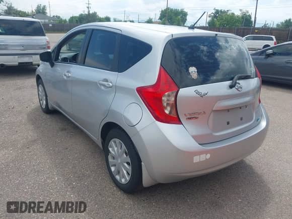 2015 Nissan Note SV z VIN 3N1CE2CP8FL398348, wystawiony jako IAAI lot #42459572 z przebiegiem 148 067 mil mil oraz . Historia ofert i sprzedaży dostępna na DreamBid. Obrazek 3.