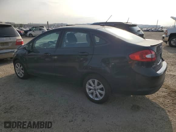 2011 Ford Fiesta SE z VIN 3FADP4BJ0BM208959, wystawiony jako Copart lot #80783925 z przebiegiem 164 521 mil mil oraz Szkoda całkowita • Salvage title. Historia ofert i sprzedaży dostępna na DreamBid. Obrazek 2.