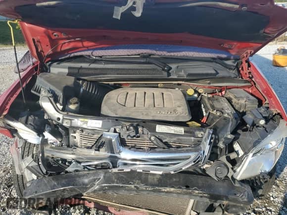 2013 Dodge Grand Caravan SE with VIN 2C4RDGBG2DR568129, listed as a Copart auction lot 71908235 with 110,135 mi miles and Salvage title. Bid and sale history available at DreamBid. Image 12.