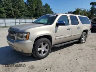 2007 Chevrolet Suburban LTZ with VIN 3GNFK16347G317059, listed as a Copart auction lot 81213085 with 202,394 mi miles and Salvage title. Bid and sale history available at DreamBid. Image 1.