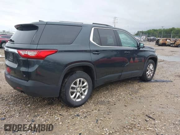 2018 Chevrolet Traverse LT Cloth z VIN 1GNEVGKW2JJ251025, wystawiony jako IAAI lot #43021931 z przebiegiem 63 014 mil mil oraz . Historia ofert i sprzedaży dostępna na DreamBid. Obrazek 4.