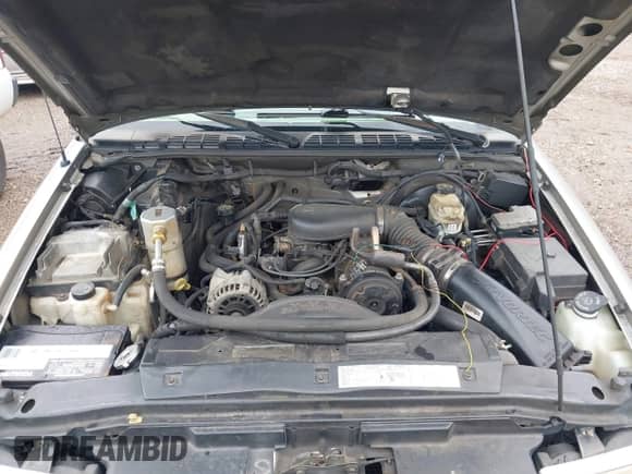 2001 Chevrolet Blazer LT z VIN 1GNCS13W112118178, wystawiony jako IAAI lot #42556250 z przebiegiem 182 771 mil mil oraz . Historia ofert i sprzedaży dostępna na DreamBid. Obrazek 10.