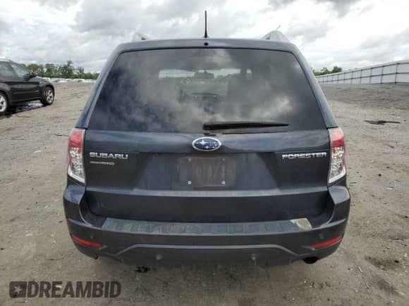 2011 Subaru Forester z VIN JF2SHBHC7BH719649, wystawiony jako Copart lot #57782065 z przebiegiem 241 157 mil mil oraz Szkoda całkowita • Salvage title. Historia ofert i sprzedaży dostępna na DreamBid. Obrazek 6.