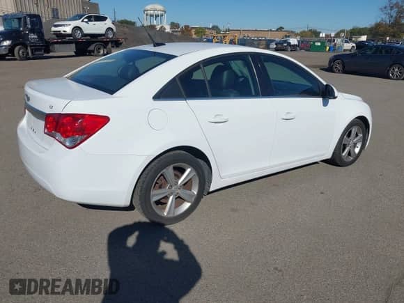 2014 Chevrolet Cruze 2LT с VIN 1G1PE5SB2E7302621, выставлен на аукционе IAAI как лот 43500103 с пробегом 143 243 миль миль и . История ставок и продаж доступна на DreamBid. Изображение 4.