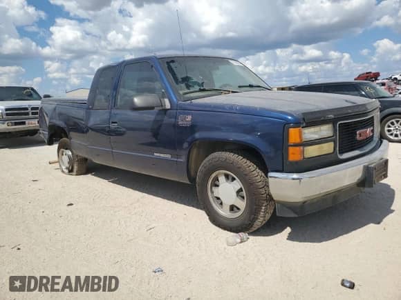 1998 GMC Sierra 1500 z VIN 1GTEC19W5WE518398, wystawiony jako Copart lot #73168034 z przebiegiem 356 084 mil mil oraz Szkoda całkowita • Salvage title. Historia ofert i sprzedaży dostępna na DreamBid. Obrazek 4.
