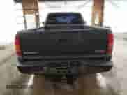 2002 GMC Sierra 1500 z VIN 1GTEK14W92Z144228, wystawiony jako Copart lot #69551834 z przebiegiem 318 824 mil mil oraz Czysty tytuł • Clean title. Historia ofert i sprzedaży dostępna na DreamBid. Obrazek 6.