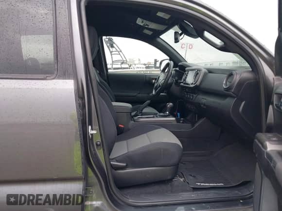 2021 Toyota Tacoma SR5 с VIN 5TFAZ5CNXMX097509, выставлен на аукционе IAAI как лот 41889399 с пробегом 81 598 миль миль и . История ставок и продаж доступна на DreamBid. Изображение 5.
