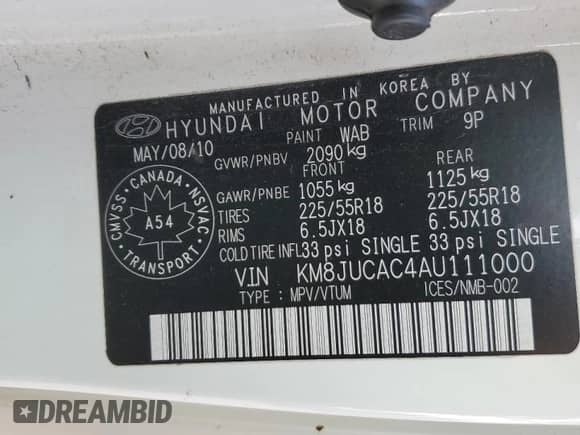 2010 Hyundai Tucson GLS with VIN KM8JUCAC4AU111000, listed as a Copart auction lot 71974685 with 211,510 mi miles and Salvage title. Bid and sale history available at DreamBid. Image 14.