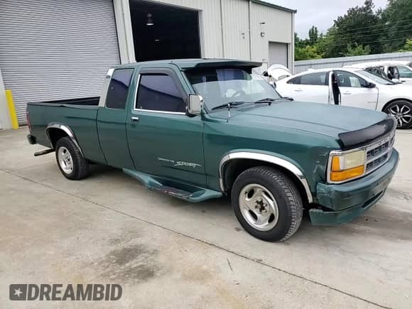 1993 Dodge Dakota z VIN 1B7FL23X3PS153914, wystawiony jako Copart lot #67756425 z przebiegiem 277 083 mil mil oraz Szkoda całkowita • Salvage title. Historia ofert i sprzedaży dostępna na DreamBid. Obrazek 13.