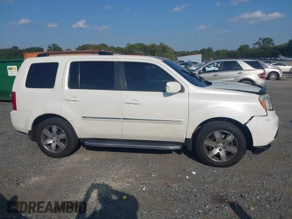 2015 Honda Pilot Touring z VIN 5FNYF4H99FB068609, wystawiony jako IAAI lot #43262856 z przebiegiem 184 790 mil mil oraz . Historia ofert i sprzedaży dostępna na DreamBid. Obrazek 13.