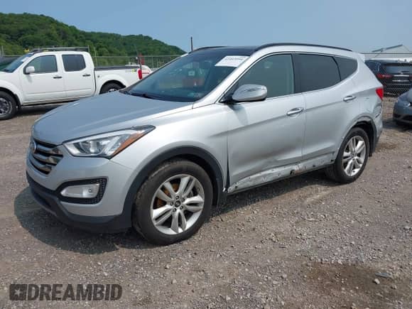 2016 Hyundai Santa Fe z VIN 5XYZWDLA9GG340754, wystawiony jako IAAI lot #42403094 z przebiegiem 77 498 mil mil oraz . Historia ofert i sprzedaży dostępna na DreamBid. Obrazek 2.