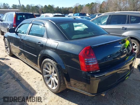 2006 Chrysler 300 C SRT-8 with VIN 2C3LA73W06H216409, listed as a IAAI auction lot 41588832 with 187,662 mi miles and . Bid and sale history available at DreamBid. Image 3.