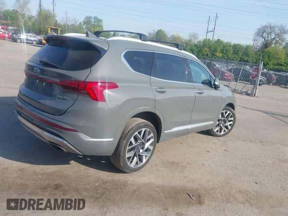 2021 Hyundai Santa Fe Calligraphy with VIN 5NMS5DAL8MH370726, listed as a IAAI auction lot 42099412 with 56,273 mi miles and . Bid and sale history available at DreamBid. Image 4.