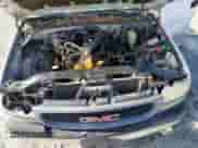 2002 GMC Sierra 1500 z VIN 1GTEC14W12Z170108, wystawiony jako Copart lot #68564144 z przebiegiem Nie podano mil oraz Szkoda całkowita • Salvage title. Historia ofert i sprzedaży dostępna na DreamBid. Obrazek 11.