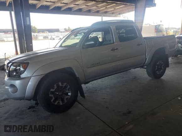 2008 Toyota Tacoma with VIN 5TELU42N18Z575687, listed as a Copart auction lot 82243385 with 115,594 mi miles and Salvage title. Bid and sale history available at DreamBid. Image 1.