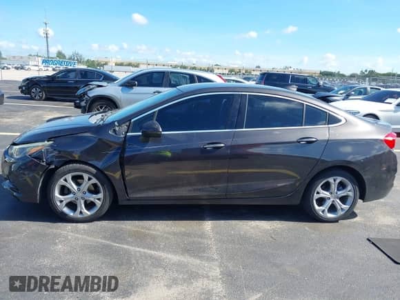 2017 Chevrolet Cruze Premier с VIN 1G1BF5SM4H7245979, выставлен на аукционе IAAI как лот 42987190 с пробегом 95 354 миль миль и . История ставок и продаж доступна на DreamBid. Изображение 14.