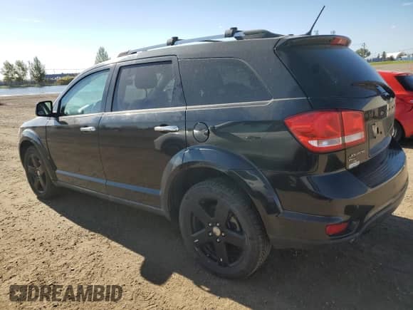2012 Dodge Journey R/T with VIN 3C4PDDFG4CT334487, listed as a Copart auction lot 84225095 with 209,450 mi miles and Clean title. Bid and sale history available at DreamBid. Image 2.
