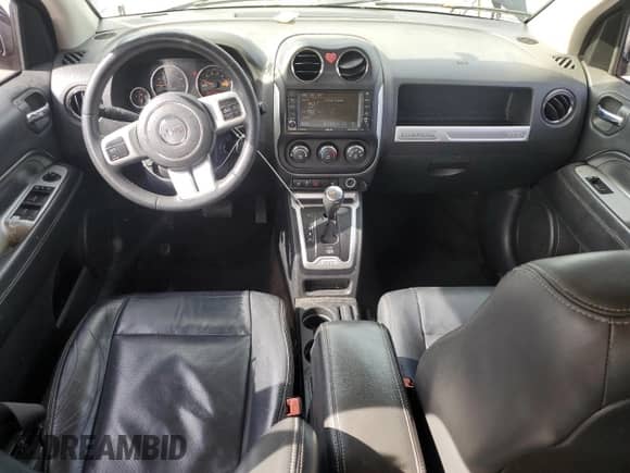 2015 Jeep Compass High Altitude с VIN 1C4NJCEA6FD240998, выставлен на аукционе Copart как лот 56063105 с пробегом 171 760 миль миль и Списание • Salvage title. История ставок и продаж доступна на DreamBid. Изображение 8.