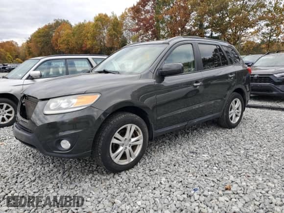 2012 Hyundai Santa Fe Limited с VIN 5XYZKDAG1CG147608, выставлен на аукционе Copart как лот 87013655 с пробегом 122 051 миль миль и Чистый • Clean title. История ставок и продаж доступна на DreamBid. Изображение 1.