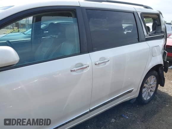 2015 Toyota Sienna Limited with VIN 5TDDK3DC9FS119513, listed as a IAAI auction lot 42290386 with 210,948 mi miles and . Bid and sale history available at DreamBid. Image 14.