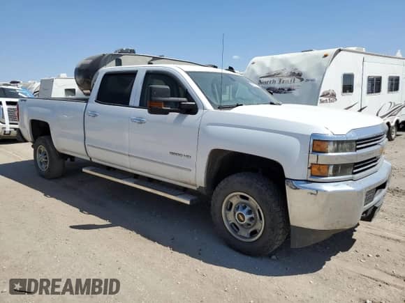 2015 Chevrolet Silverado 2500HD Work Truck z VIN 1GC1KUEG0FF536514, wystawiony jako Copart lot #53471415 z przebiegiem 187 156 mil mil oraz Szkoda całkowita • Salvage title. Historia ofert i sprzedaży dostępna na DreamBid. Obrazek 4.