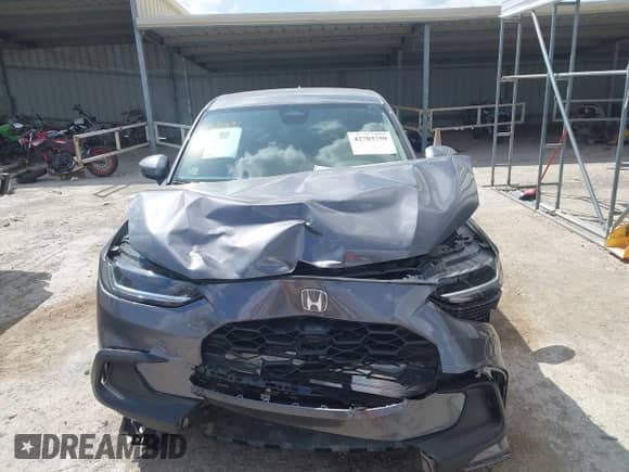 2025 Honda HR-V LX с VIN 3CZRZ1H30SM714187, выставлен на аукционе IAAI как лот 42703759 с пробегом 2 761 миль миль и . История ставок и продаж доступна на DreamBid. Изображение 13.