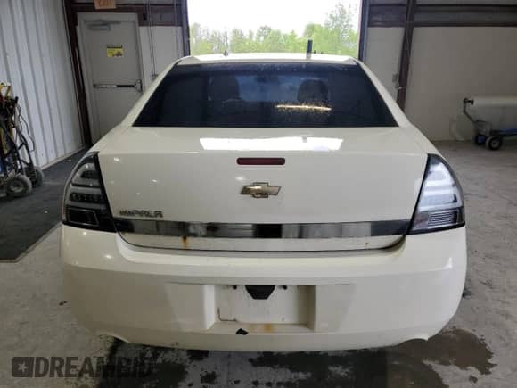 2007 Chevrolet Impala Police Police z VIN 2G1WS55R379373048, wystawiony jako Copart lot #58200385 z przebiegiem 101 742 mil mil oraz Szkoda całkowita • Salvage title. Historia ofert i sprzedaży dostępna na DreamBid. Obrazek 6.